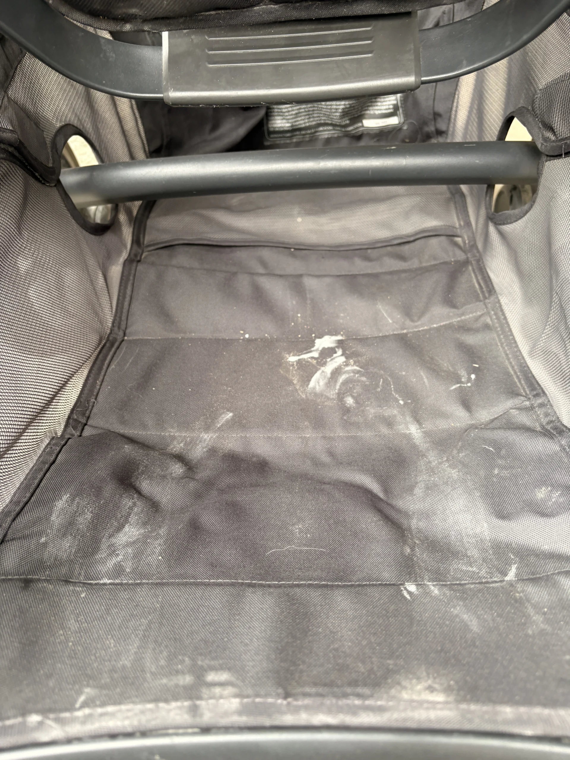 Dirty stroller before cleaning